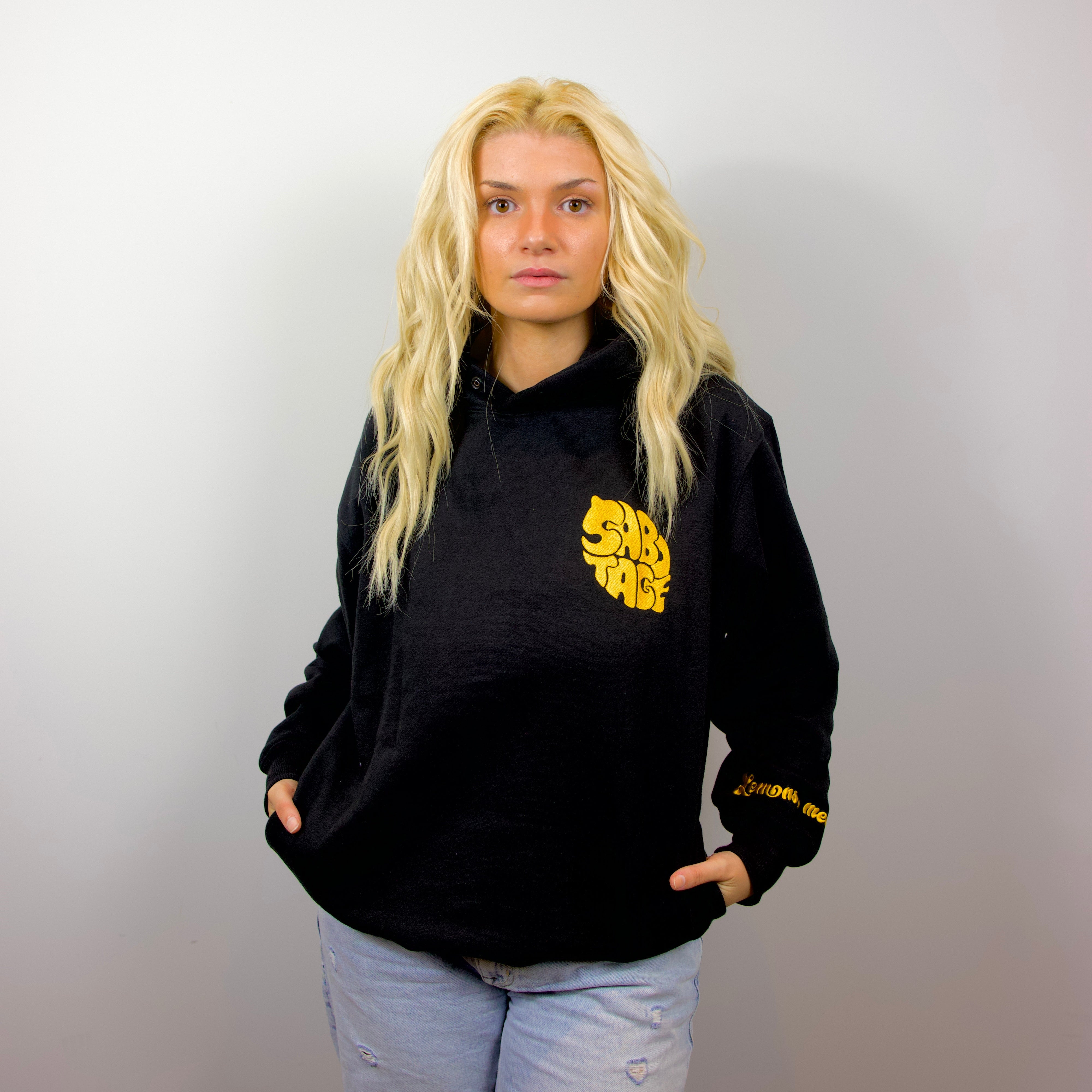 Model wearing Lemon Hoodie premium streetwear