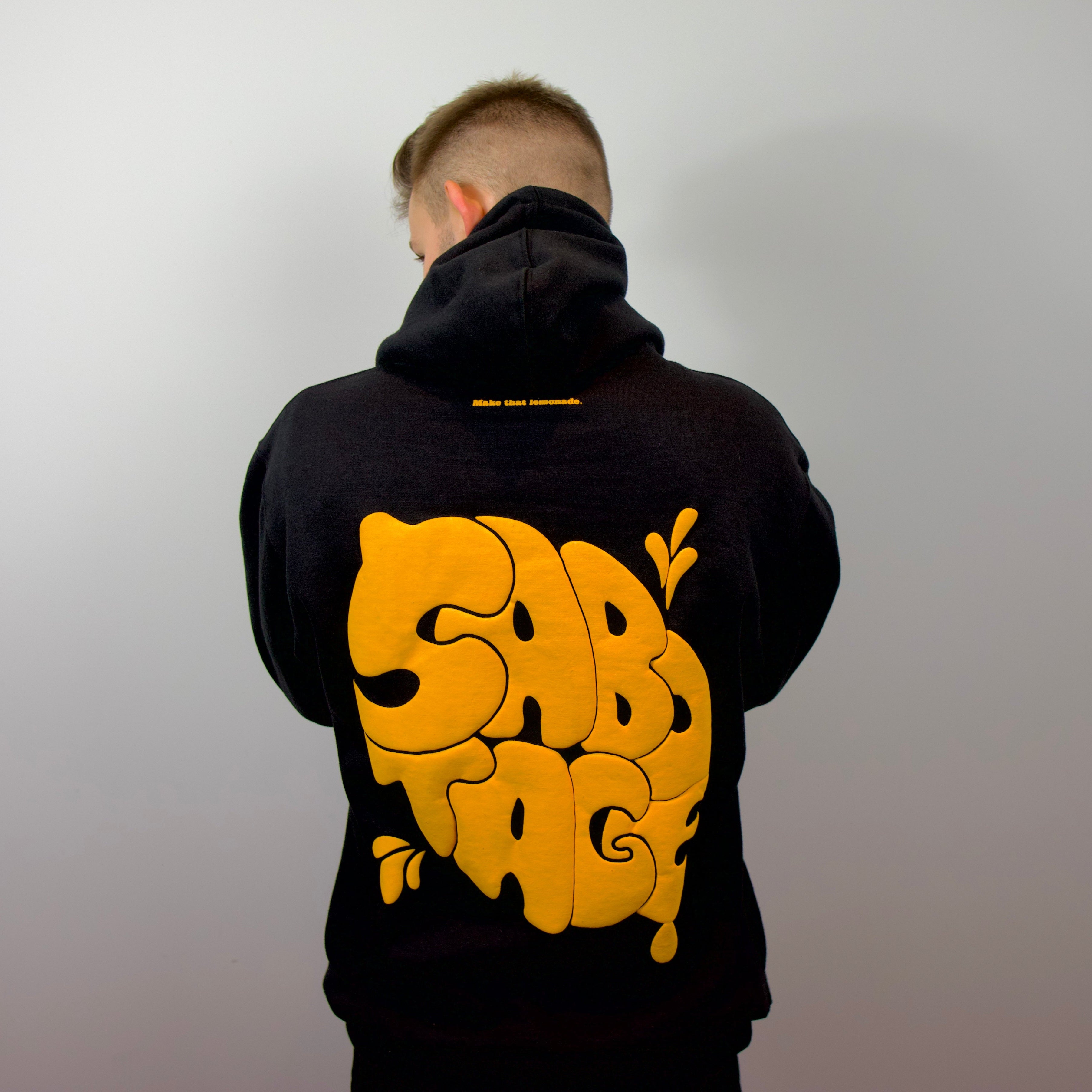 Man wearing Lemon Hoodie luxury hoodie back logo and premium cotton shot